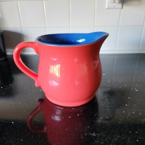 Orange and blue pitcher/planter/vase